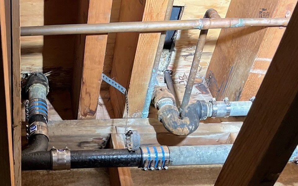 Drain and supply in a joist bay